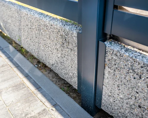 modern-fence-and-sidewalk-in-residential-area-2026-03-24-09-00-40-utc
